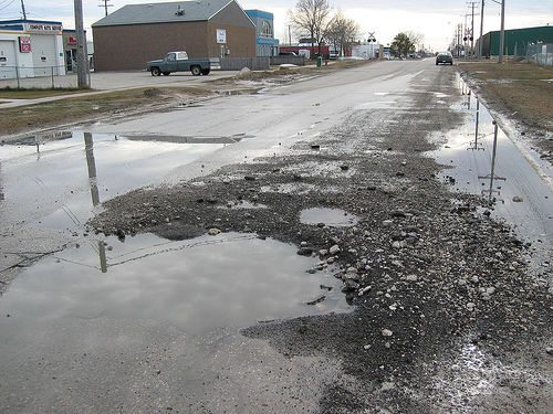 Week in Traffic: Street fights, traffic monsters, and “grand-canyon” potholes